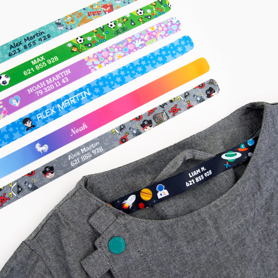 Cinta para colgar ropa de coser Stikets cosida en el cuello de una prenda infantil