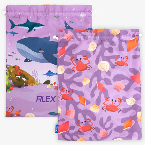 Dos bolsas de muda con diseños marinos distintos