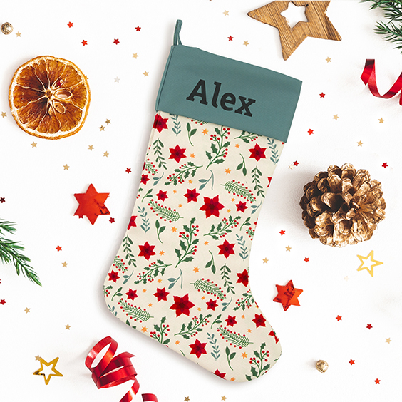 Calcetín navideño Flor de Nochebuena de Stikets con el nombre Alex impreso en el dobladillo